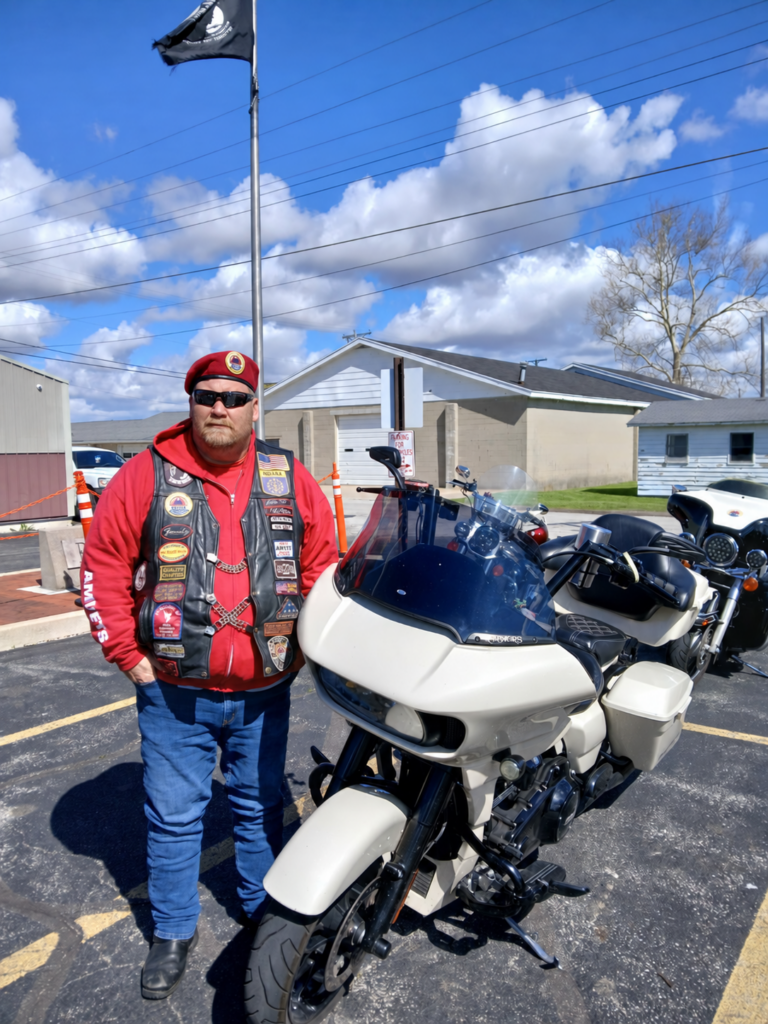 AMVETS Chaplain John Hipps AMVETS National Chaplain John Hipps with his motorcycle